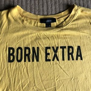 “Born extra” yellow crop top